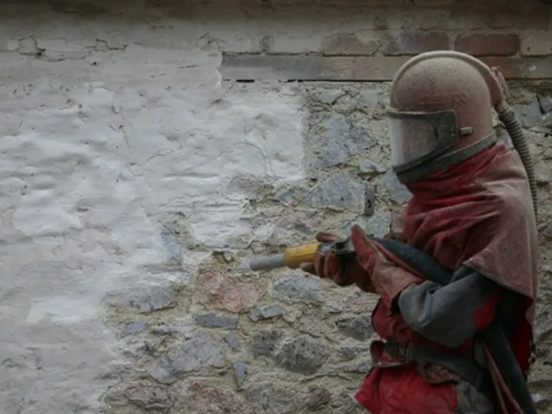 Concrete masonry coated with breathable protective paint